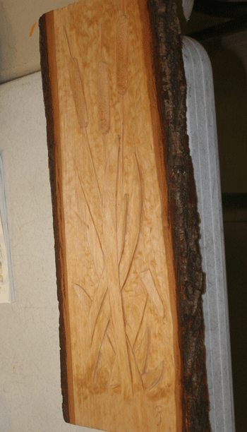 relief carving cat tails