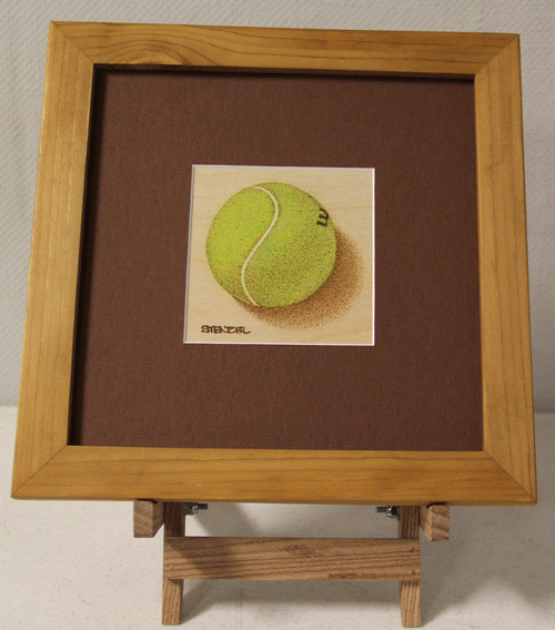 woodburned tennis ball